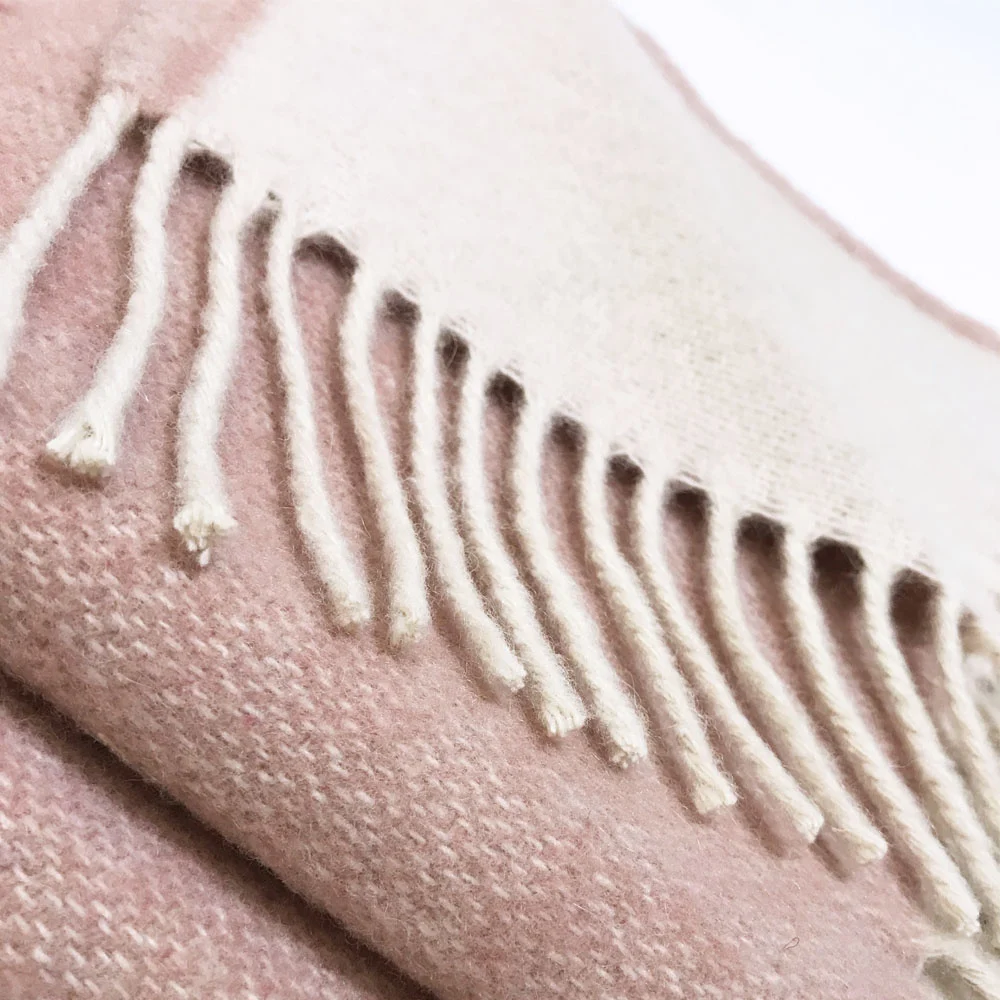 Plaid en laine rose